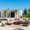 4 Seasons Outdoor Comino hoek loungebank met Saba low dining tuintafel latte met teak blad Ø 130 cm en Comino low dining chair